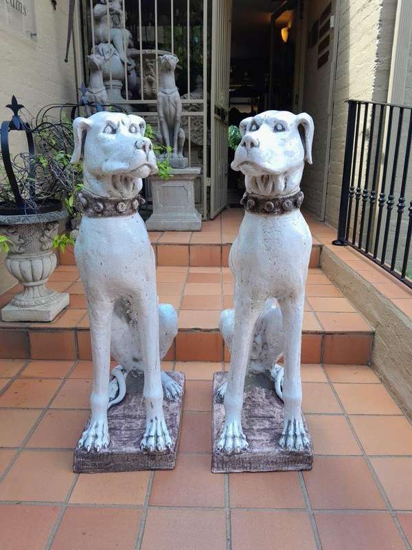 An Early 20th Century Pair Of Italian Porcelain Decorative Dogs On Clay Bases ND