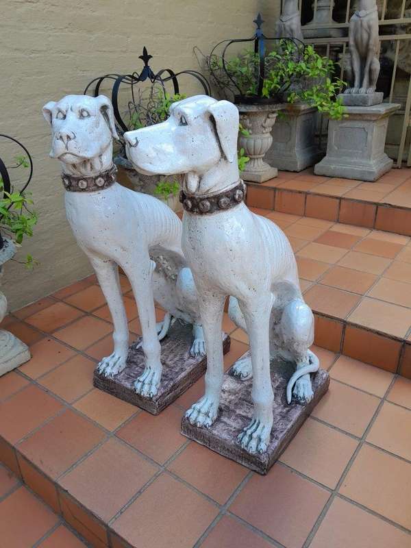 An Early 20th Century Pair Of Italian Porcelain Decorative Dogs On Clay Bases ND