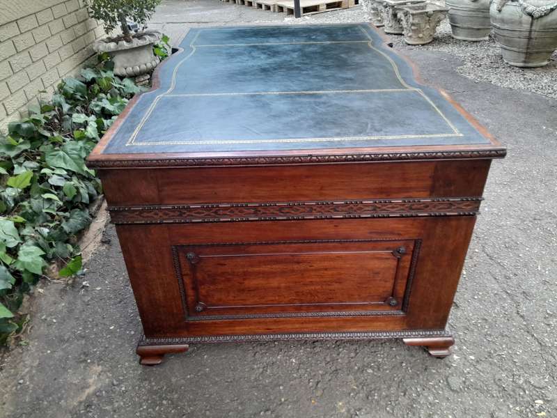 A 20th Century Large Mahogany Partners Pedestal Desk With Black Leather Top And Drawers On Bracke...