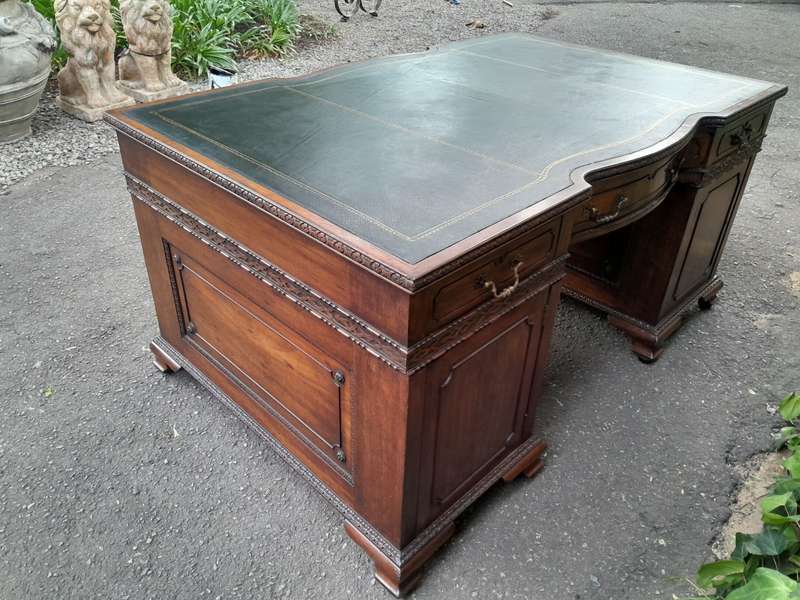 A 20th Century Large Mahogany Partners Pedestal Desk With Black Leather Top And Drawers On Bracke...