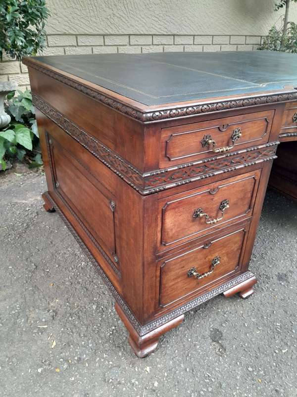 A 20th Century Large Mahogany Partners Pedestal Desk With Black Leather Top And Drawers On Bracke...