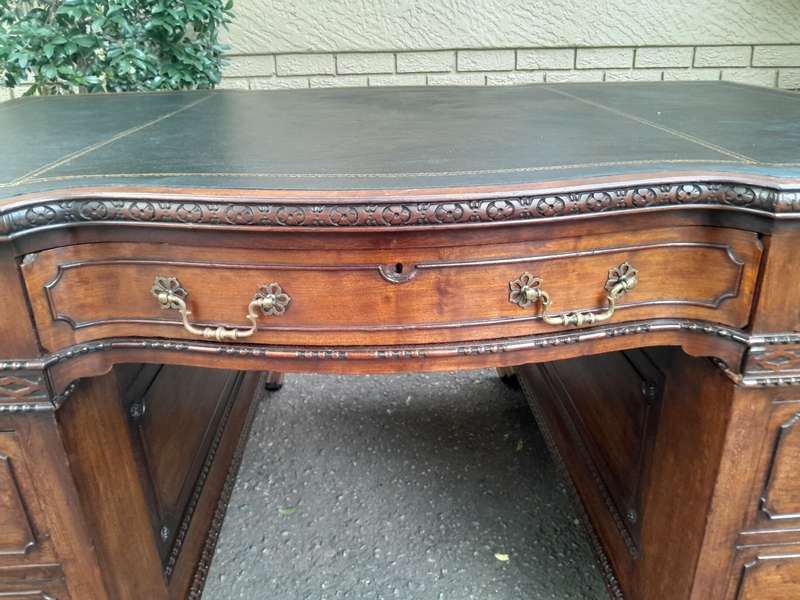 A 20th Century Large Mahogany Partners Pedestal Desk With Black Leather Top And Drawers On Bracke...