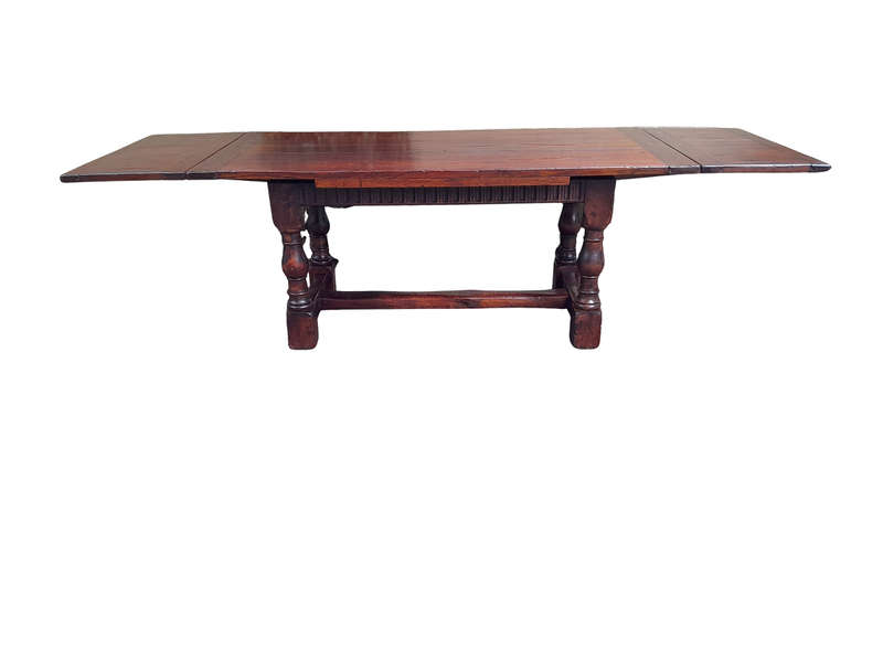 An Antique 19th Century Oak Refectory Table On Stretcher Base With Two Drawer Leaves