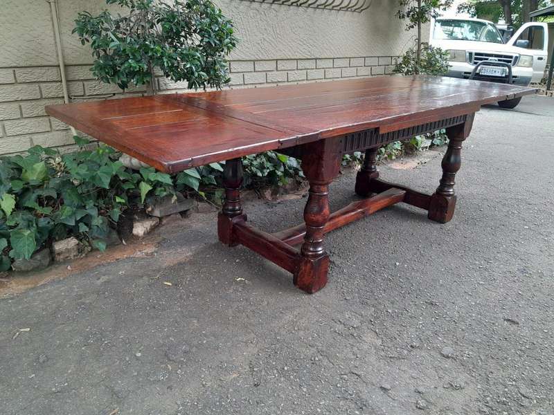 An Antique 19th Century Oak Refectory Table On Stretcher Base With Two Drawer Leaves