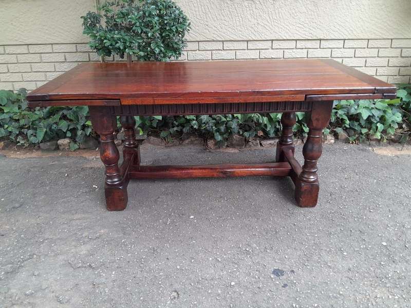 An Antique 19th Century Oak Refectory Table On Stretcher Base With Two Drawer Leaves
