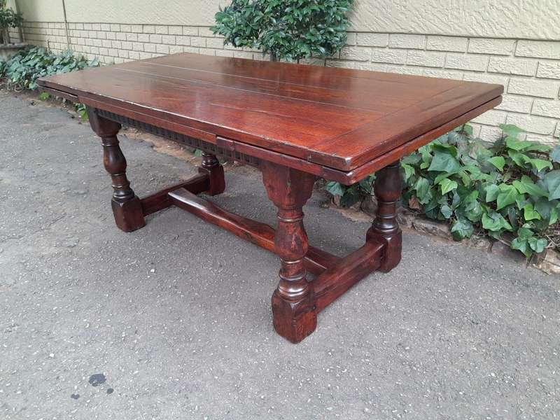 An Antique 19th Century Oak Refectory Table On Stretcher Base With Two Drawer Leaves