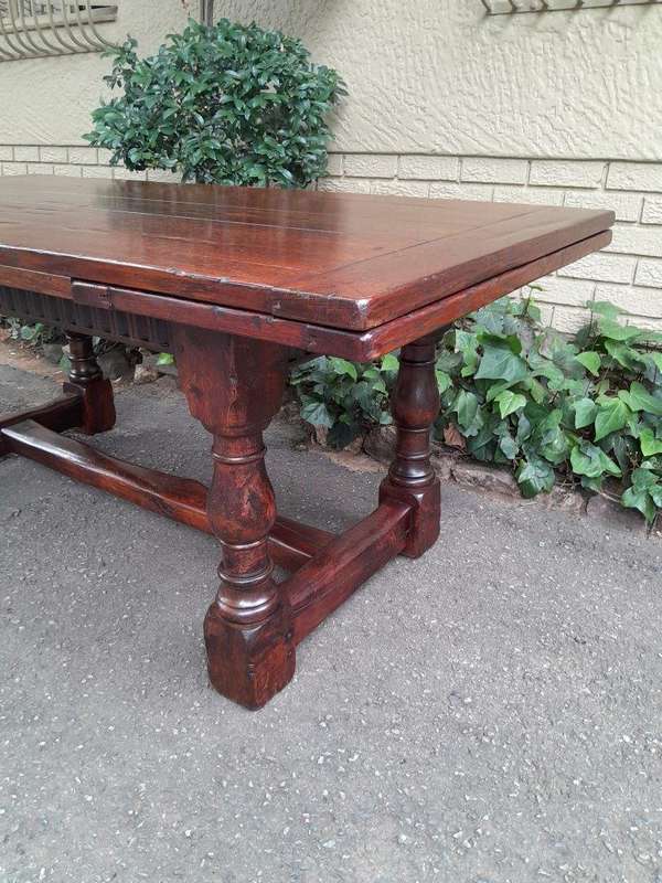 An Antique 19th Century Oak Refectory Table On Stretcher Base With Two Drawer Leaves