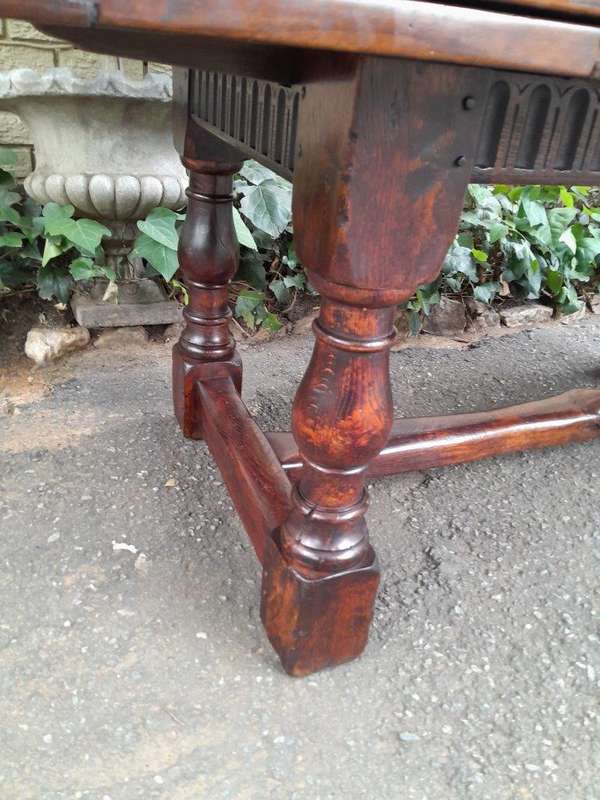 An Antique 19th Century Oak Refectory Table On Stretcher Base With Two Drawer Leaves