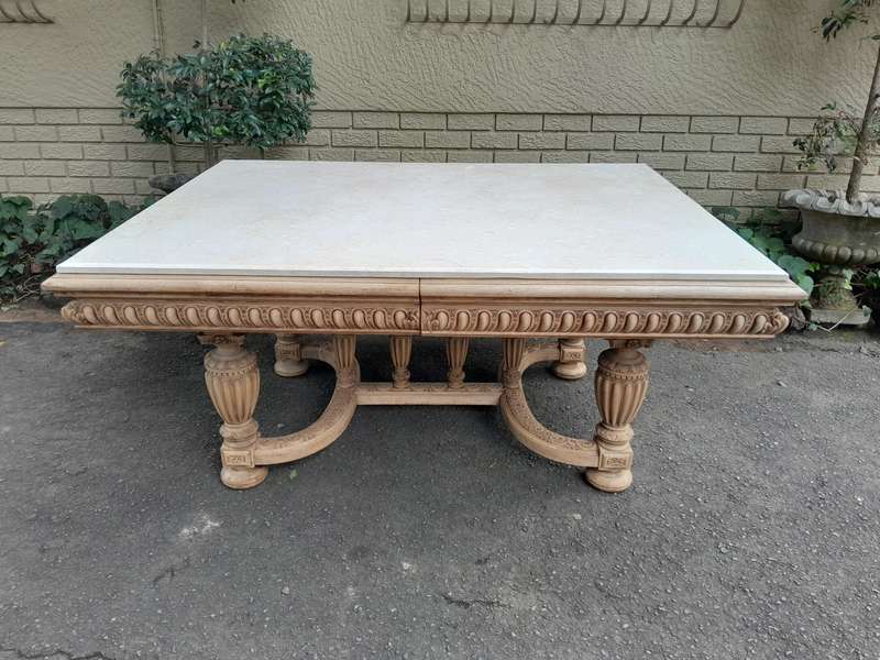 A 20th Century Heavily Carved Mahogany Dining  / Entrance Table In A Bleached Contemporary Finish