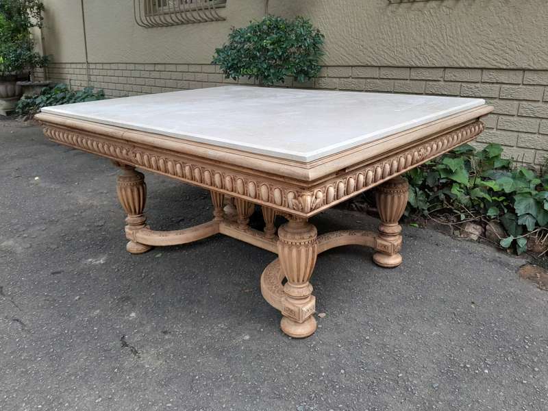 A 20th Century Heavily Carved Mahogany Dining  / Entrance Table In A Bleached Contemporary Finish