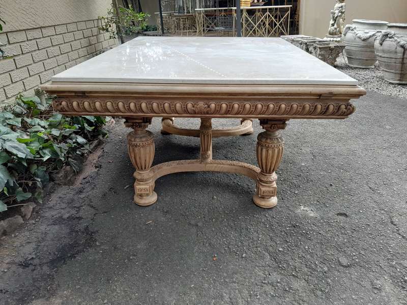A 20th Century Heavily Carved Mahogany Dining  / Entrance Table In A Bleached Contemporary Finish