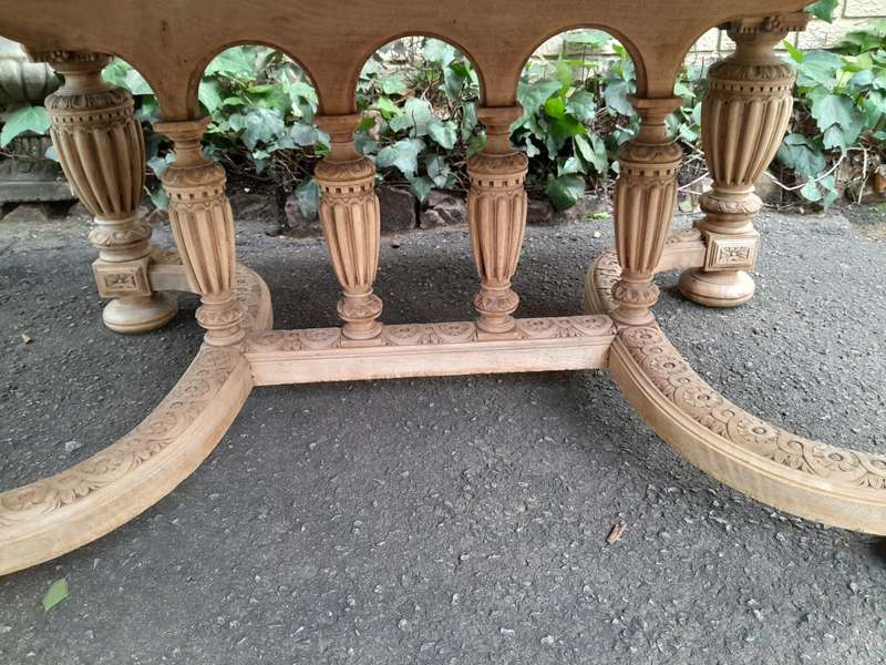 A 20th Century Heavily Carved Mahogany Dining  / Entrance Table In A Bleached Contemporary Finish