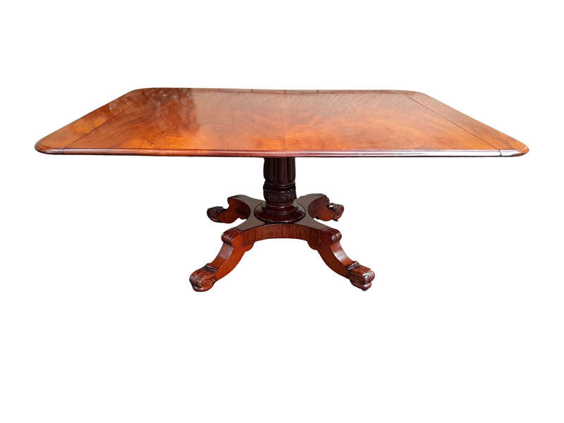 An Antique William IV Breakfast Table With Hinged Top On Castors