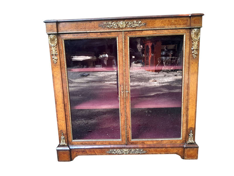 A Victorian Walnut Credenza / Display Cabinet With Gilt Mounts And Glazed Doors With Shelves On B...