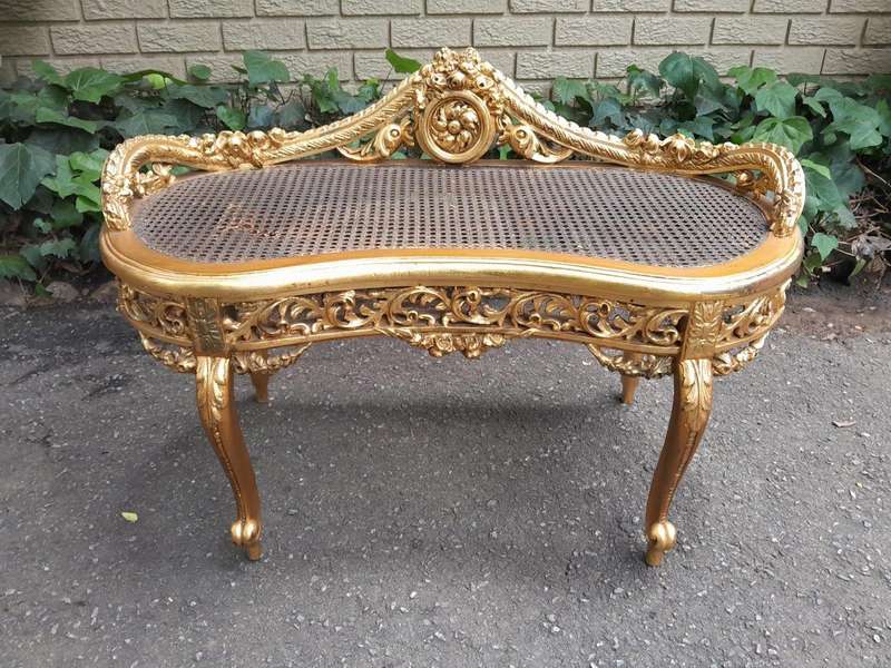 A 20th Century French Ornately Carved Giltwood And Rattan Window Seat
