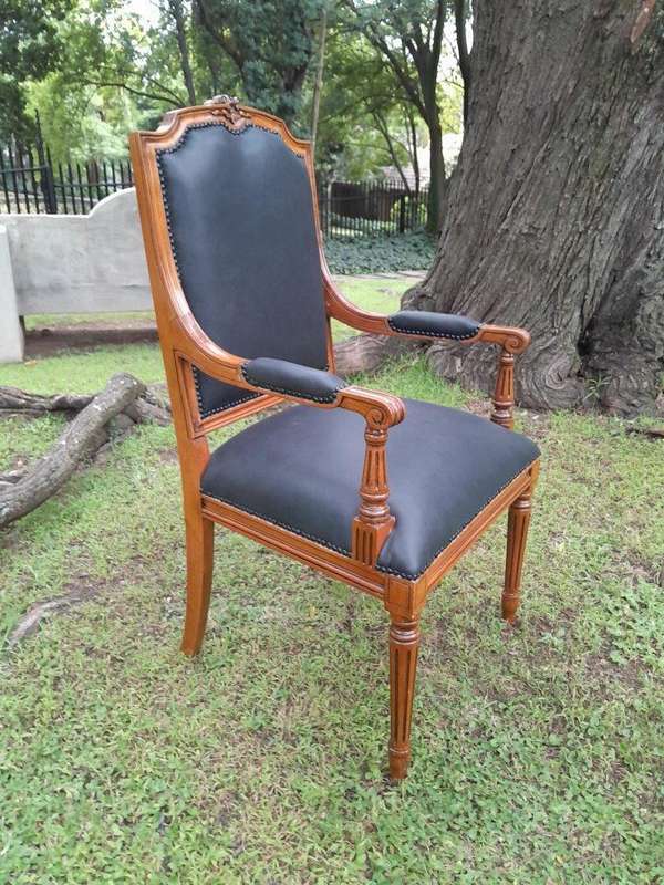 A 20th Century French Style Carved Mahogany Armchair