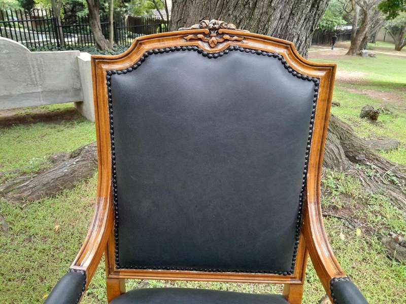 A 20th Century French Style Carved Mahogany Armchair