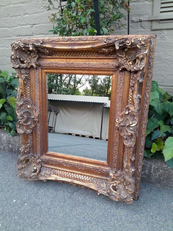A 20th Century French Baroque Style Gilded And Bevelled Plate Mirror