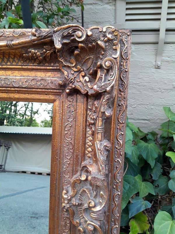 A 20th Century French Baroque Style Gilded And Bevelled Plate Mirror