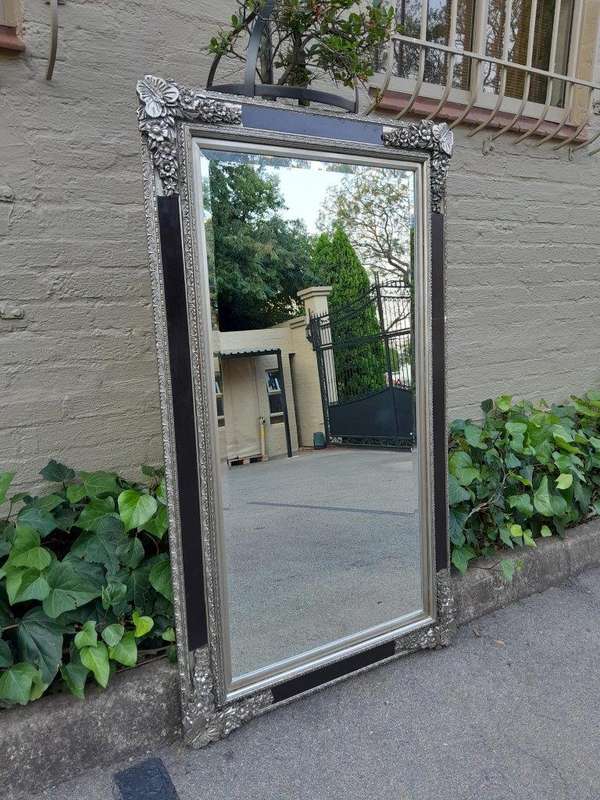 A French Baroque Style Large Bevelled Plate Black And Silver Leaf Mirror