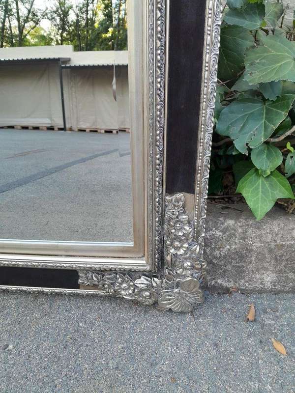 A French Baroque Style Large Bevelled Plate Black And Silver Leaf Mirror