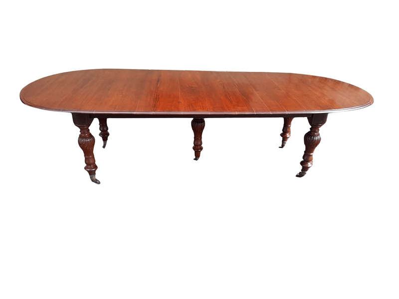 A 20th Century French Colonial Table on Original Brass Castors