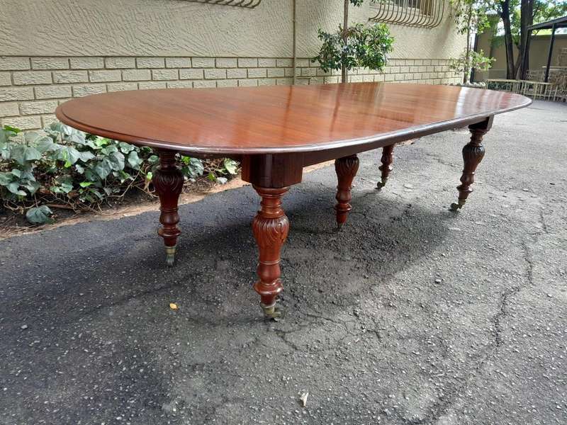 A 20th Century French Colonial Table on Original Brass Castors