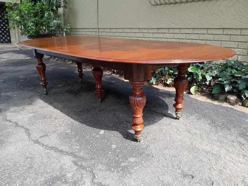 A 20th Century French Colonial Table on Original Brass Castors