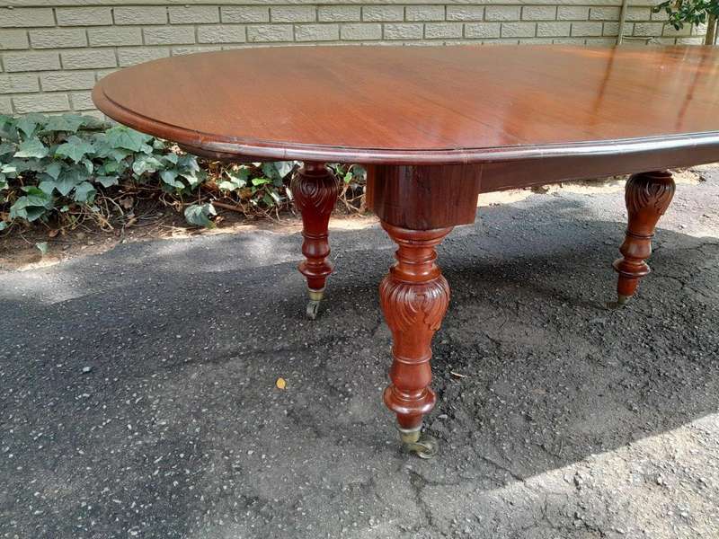 A 20th Century French Colonial Table on Original Brass Castors