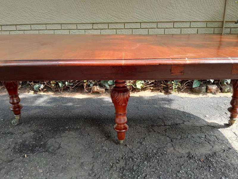 A 20th Century French Colonial Table on Original Brass Castors