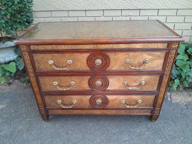 A Theodore Alexander Verre Églomisé Chest With Three Drawers And Brass Decoration