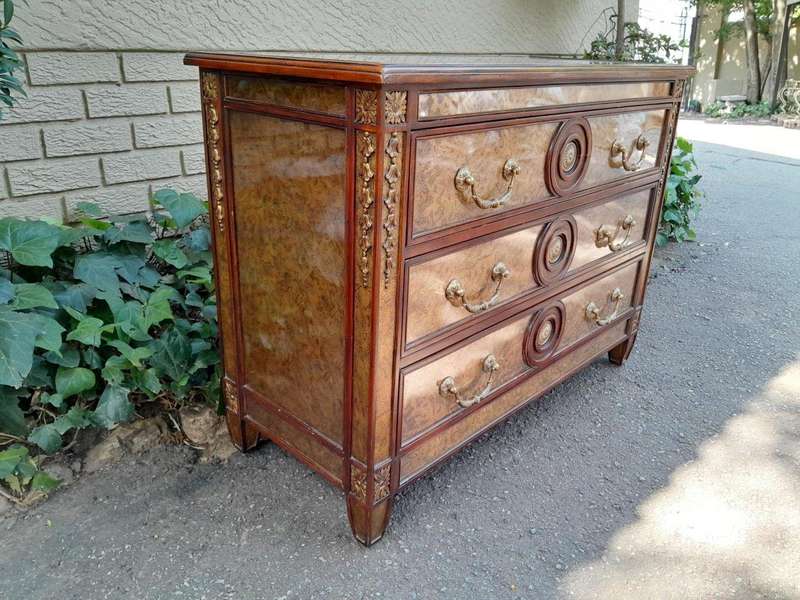 A Theodore Alexander Verre Églomisé Chest With Three Drawers And Brass Decoration