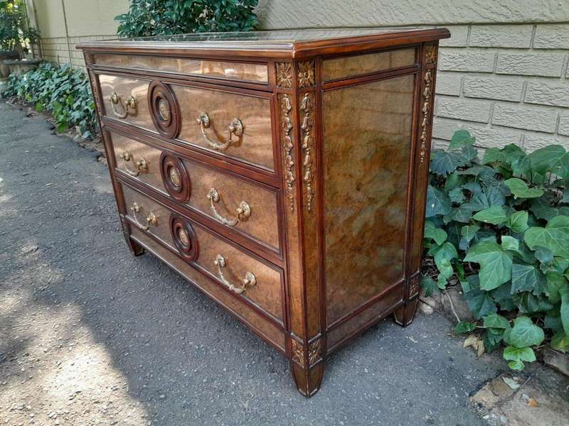 A Theodore Alexander Verre Églomisé Chest With Three Drawers And Brass Decoration