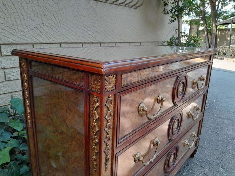 A Theodore Alexander Verre Églomisé Chest With Three Drawers And Brass Decoration