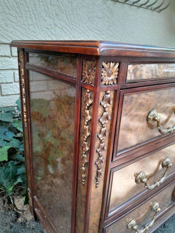 A Theodore Alexander Verre Églomisé Chest With Three Drawers And Brass Decoration
