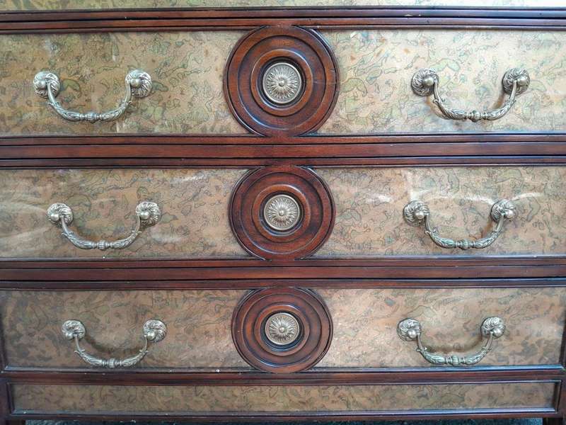 A Theodore Alexander Verre Églomisé Chest With Three Drawers And Brass Decoration