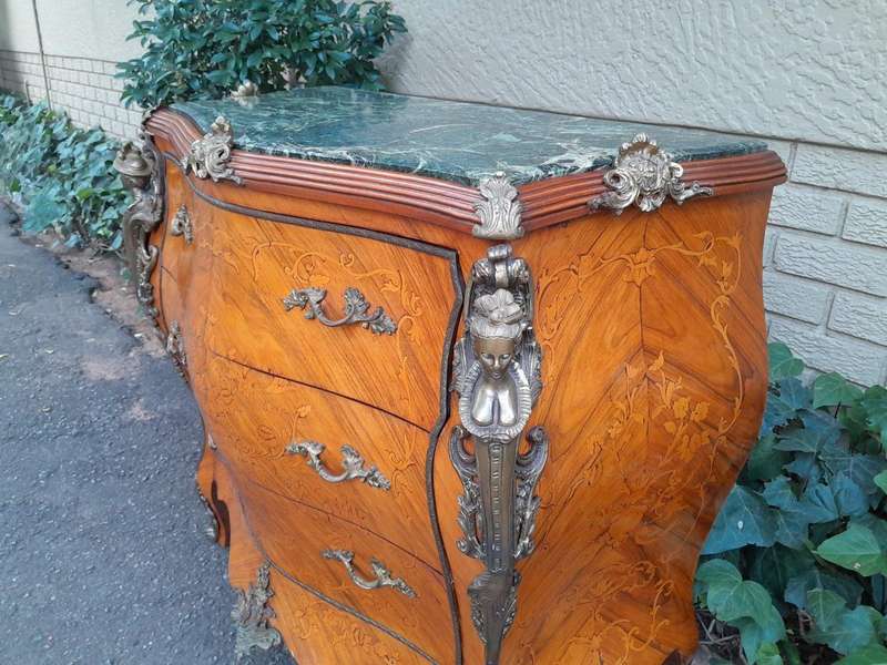 A 20th Century French Style Bombe Chest Of Drawers With Marble Top And Gilt Mounts