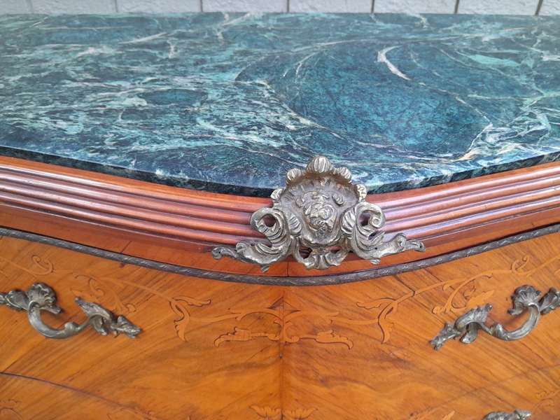 A 20th Century French Style Bombe Chest Of Drawers With Marble Top And Gilt Mounts