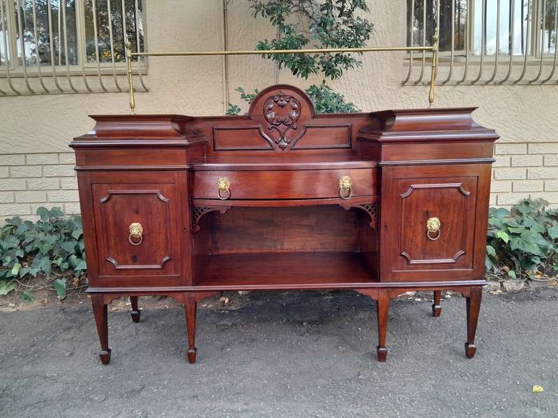 A 19th Century Mahogany Sideboard with Brass Gallery Rail and Brass Handles