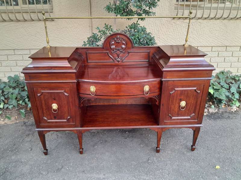 A 19th Century Mahogany Sideboard with Brass Gallery Rail and Brass Handles