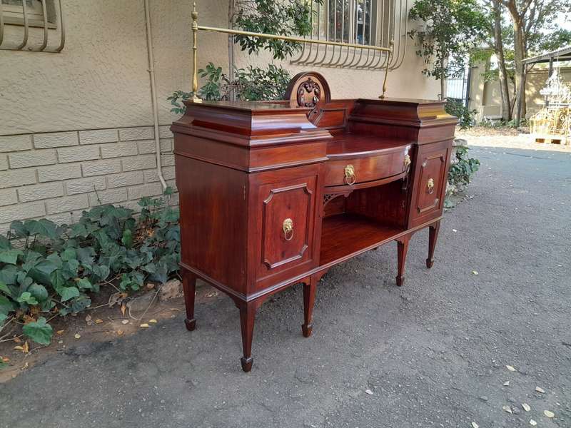 A 19th Century Mahogany Sideboard with Brass Gallery Rail and Brass Handles