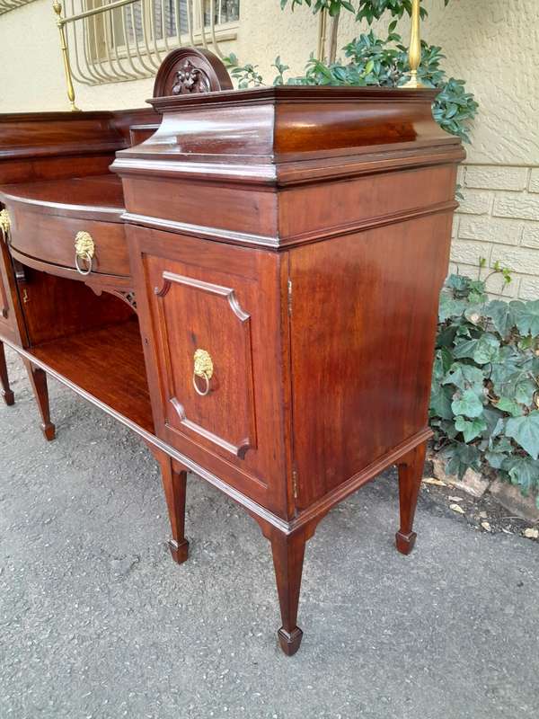 A 19th Century Mahogany Sideboard with Brass Gallery Rail and Brass Handles