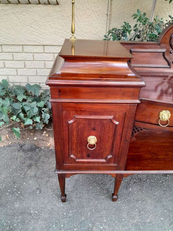A 19th Century Mahogany Sideboard with Brass Gallery Rail and Brass Handles