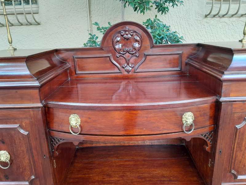 A 19th Century Mahogany Sideboard with Brass Gallery Rail and Brass Handles