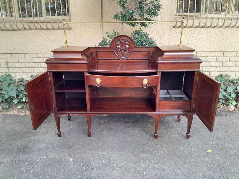 A 19th Century Mahogany Sideboard with Brass Gallery Rail and Brass Handles