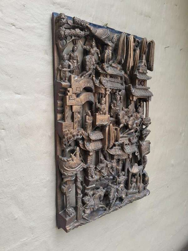 A Heavily Carved Wooden Chinese Giltwood Panel