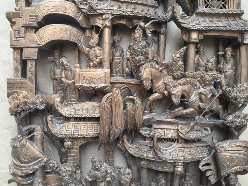 A Heavily Carved Wooden Chinese Giltwood Panel