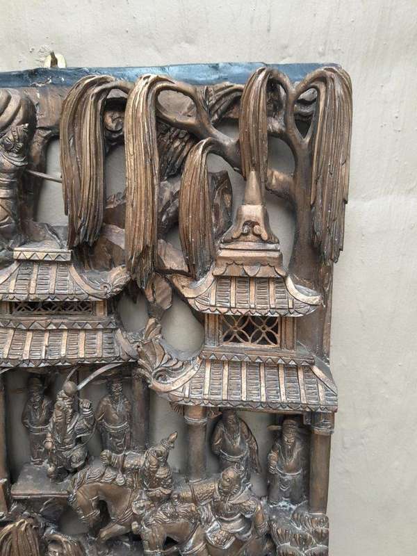 A Heavily Carved Wooden Chinese Giltwood Panel