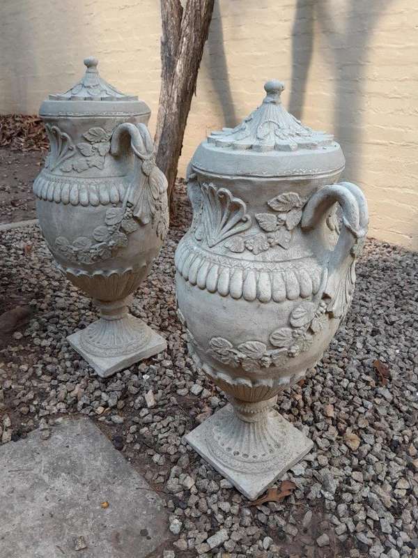A Pair of Urns with Handles and Lids Finished in a Concrete Patina Colour