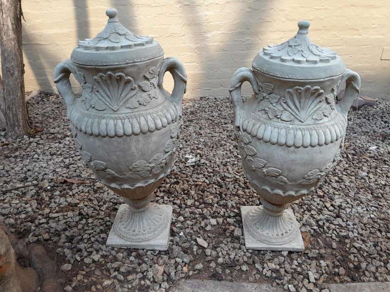 A Pair of Urns with Handles and Lids Finished in a Concrete Patina Colour
